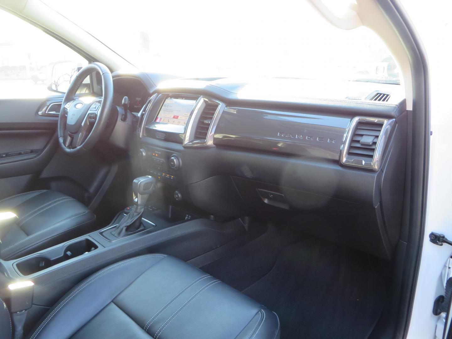 2019 White /Black Ford Ranger Lariat (1FTER4FHXKL) with an 2.3L engine, automatic transmission, located at 2630 Grass Valley Highway, Auburn, CA, 95603, (530) 508-5100, 38.937893, -121.095482 - Features a Fabtech suspension system, Fuel Offroad wheels, Nitto Ridge Grappler tires, Westin Running boards, and a Bakflip. - Photo#45